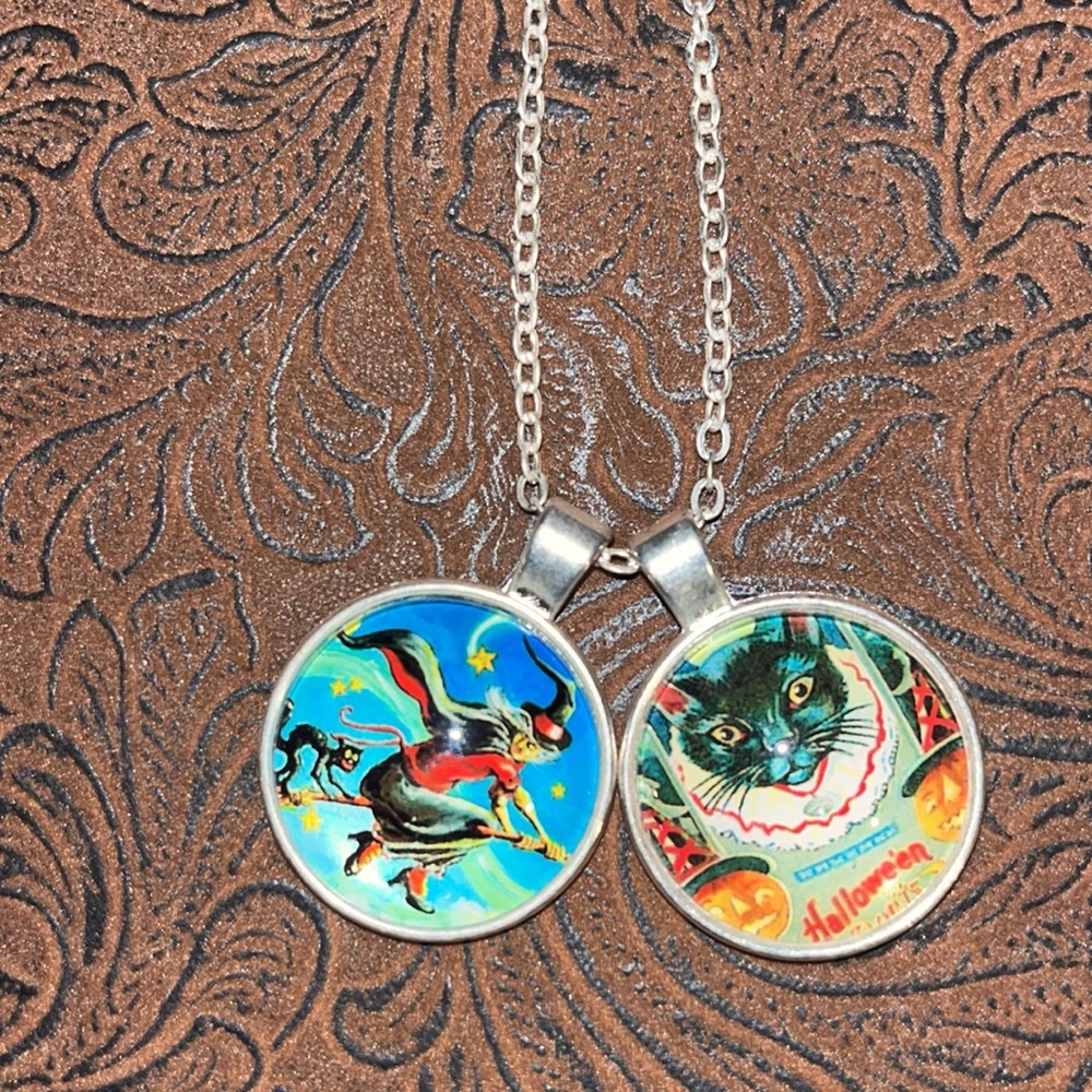 Halloween silvertone necklace with 2 pendants - a cat and a witch.